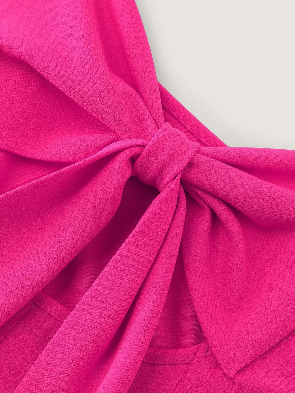 Bow-tiful Back Pleated Mini Dress